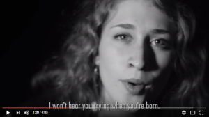 Woman sings I won't hear you crying when you're born (captions)